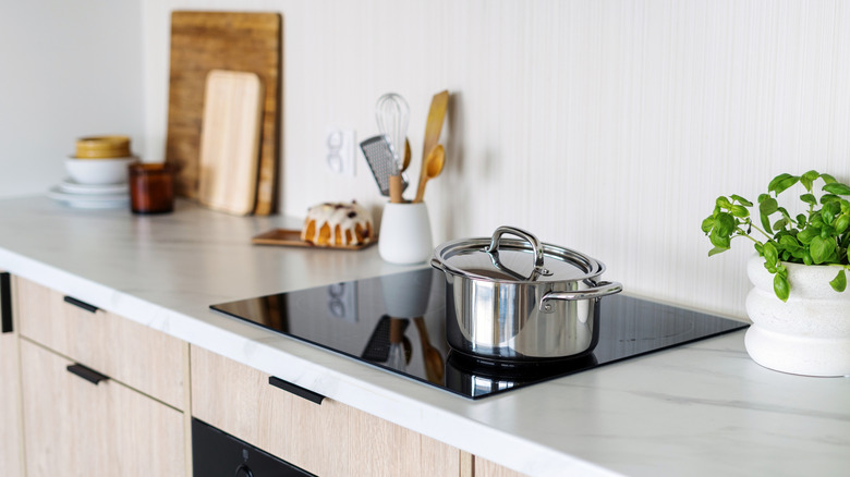 An induction range in a kitchen.
