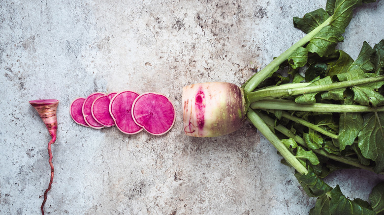 Watermelon radish in slices on a table