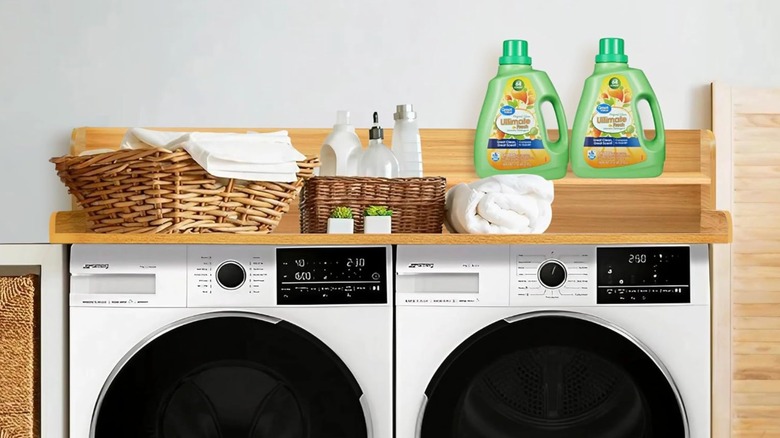 Two-tier oak washer and dryer countertop.