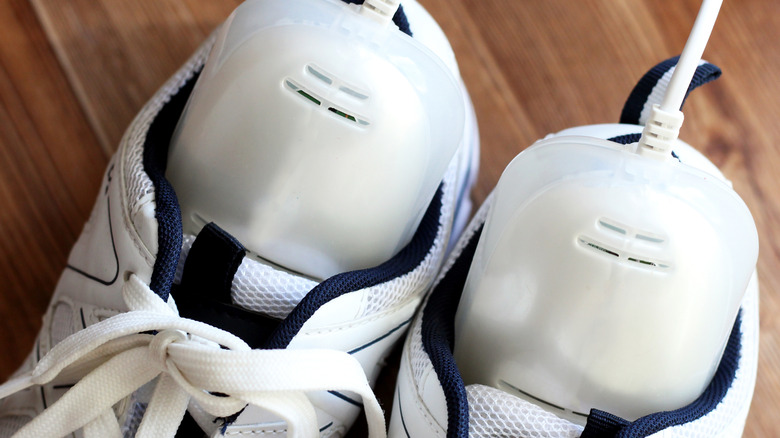 UV shoe sanitizers in white sneakers