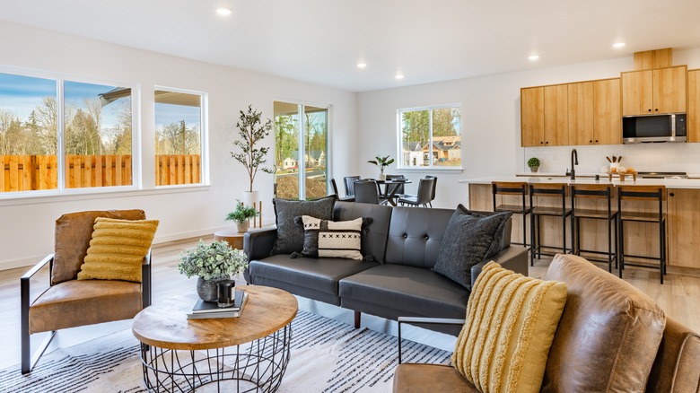 A seating area in an open concept living room.