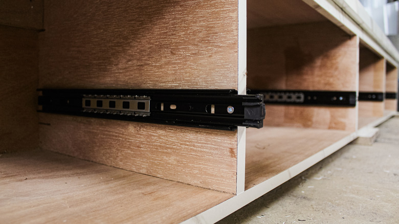 closeup on tracks inside drawer