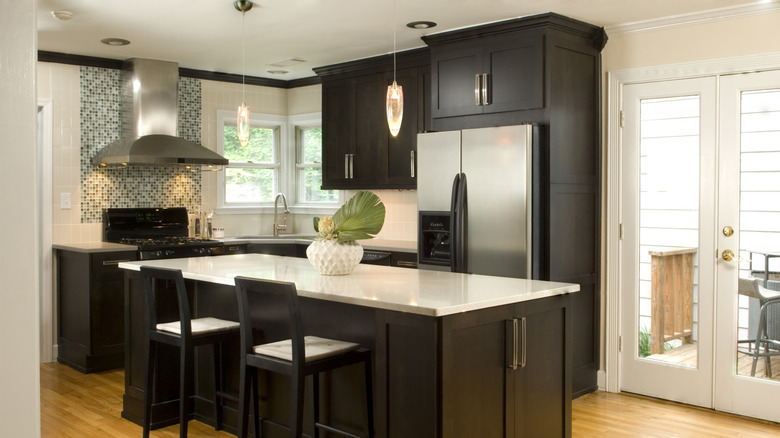 Dark wood cabinetry in kitchen