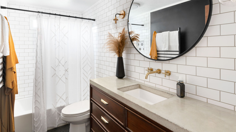 Dark wood vanity in bathroom