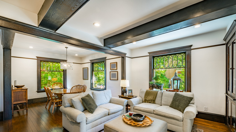 white ceiling with dark wood beams