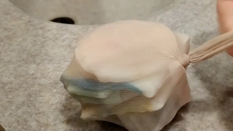 scrap pieces of soap bars in an old pair of tights