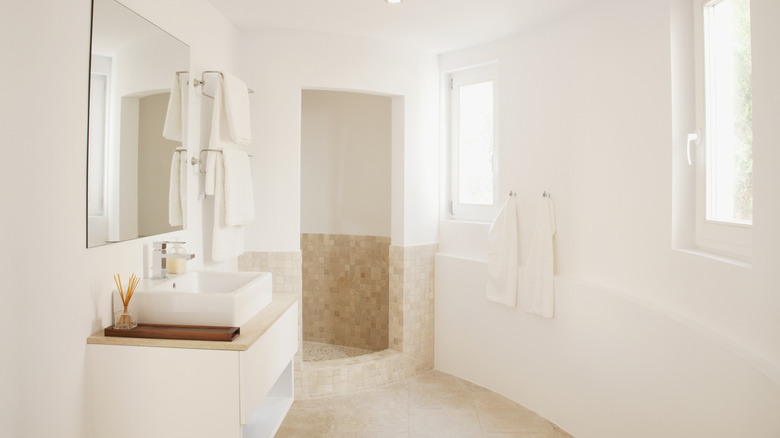 An ivory colored minimalist bathroom