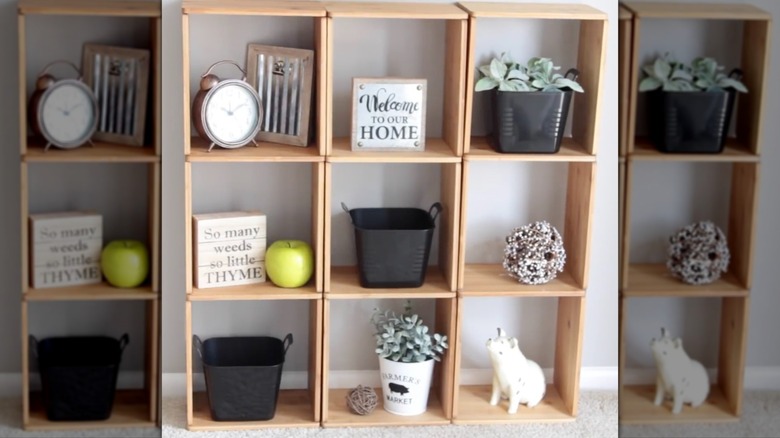 Cube shelves built out of Dollar Tree bamboo cutting boards.