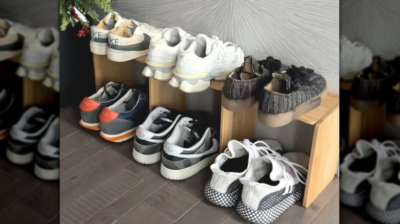 Homemade shoe rack using Dollar Tree cutting boards.