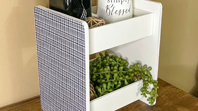 Small display shelf made out of Dollar Tree crates and cutting boards.