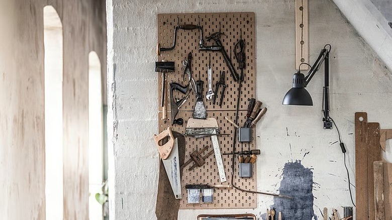 IKEA SKÅDIS holding garage and home improvement tools