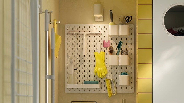 IKEA SKÅDIS with cleaning supplies on it