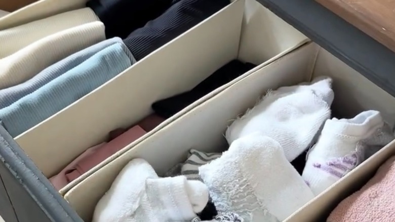 Close up of drawer organizer made from fabric bins from Dollar Tree