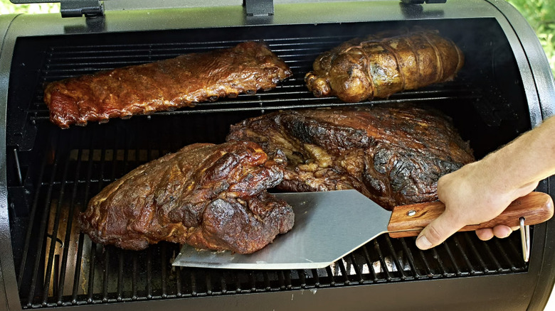 Pit Boss large spatula flipping meat on grill
