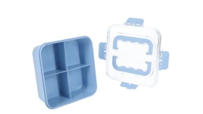 A blue plastic container with four divided sections and a lid