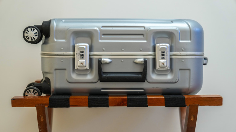 Suitcase on luggage rack