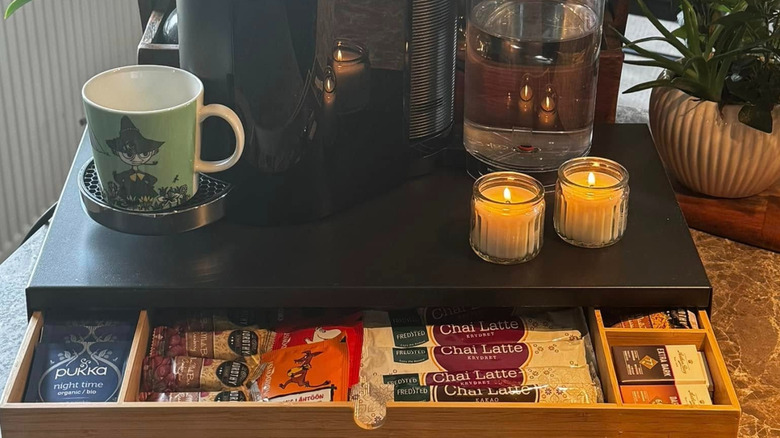 ELLOVEN Monitor stand being used as a coffee and tea station