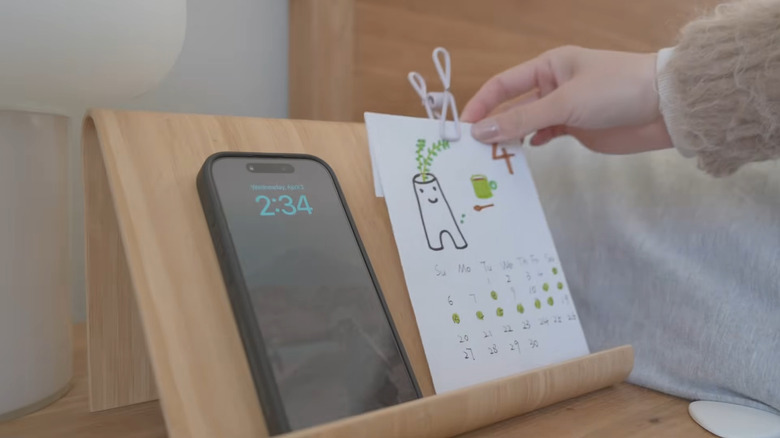 VIVALLA Tablet stand being used as a phone and calendar holder