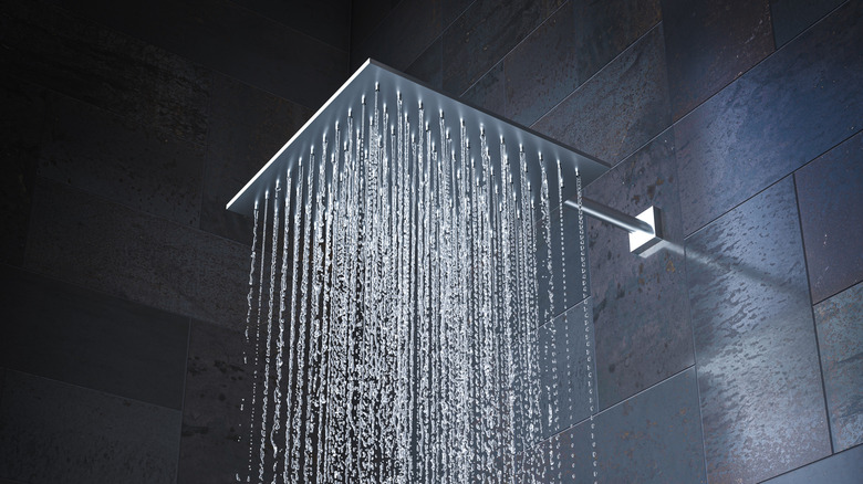 Rain-style square shower head pouring water