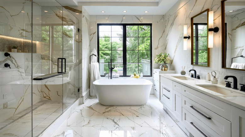 modern bright bathroom with marble floor and soaking tub