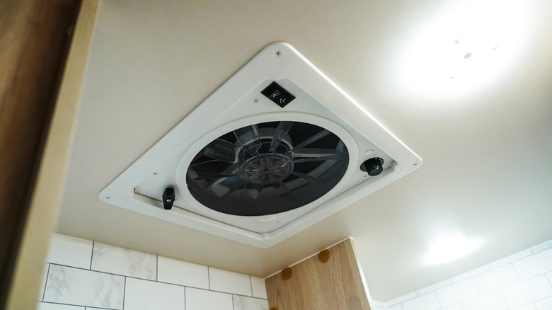 modern exhaust fan on bathroom ceiling
