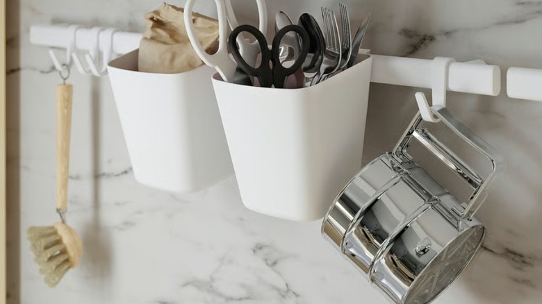 IKEA rail with hooks and containers