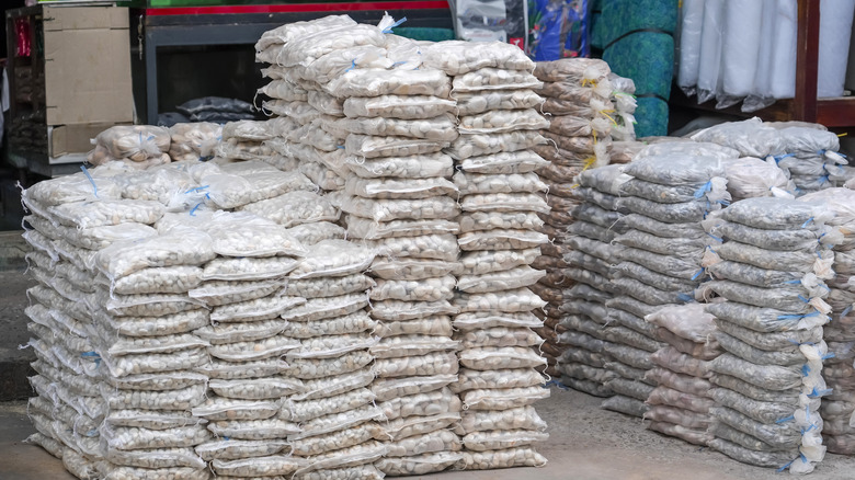 Bags of gravel and stores at a home improvement store