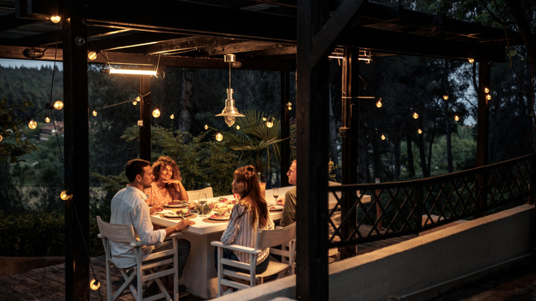 lights in the seating area of the garden