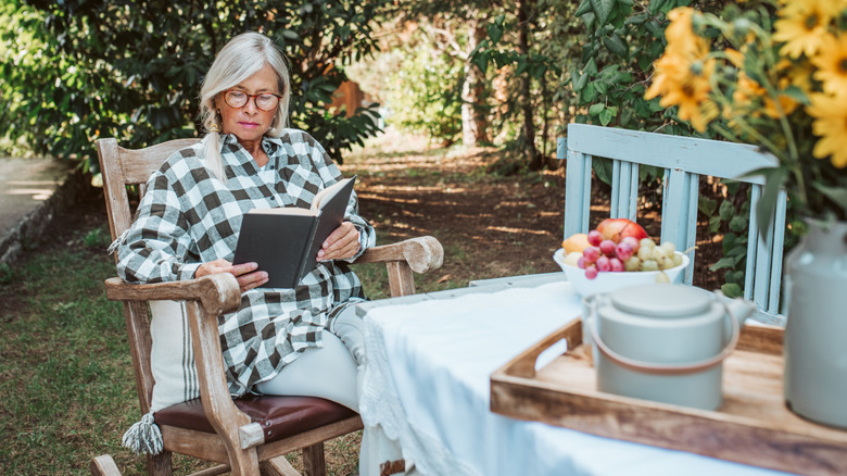 reading a book in an area in the garden