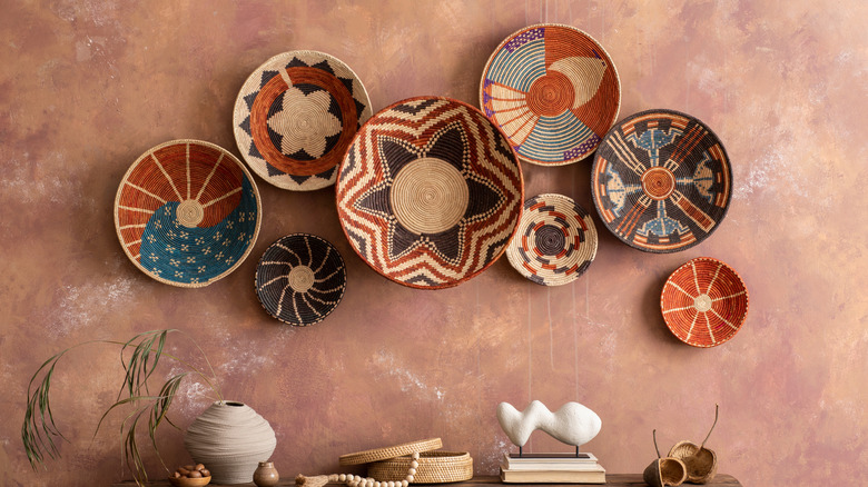Boho living room with basket wall art