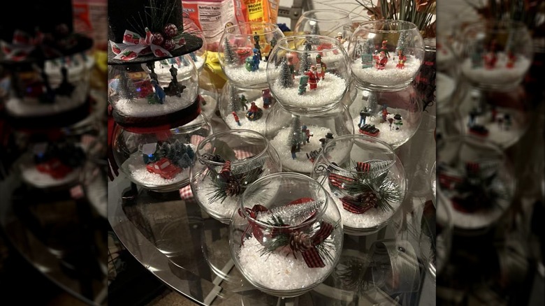 Assorted DIY snow globes made from dollar tree items