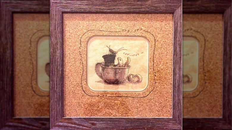 Embroidery panel inside a cork mat