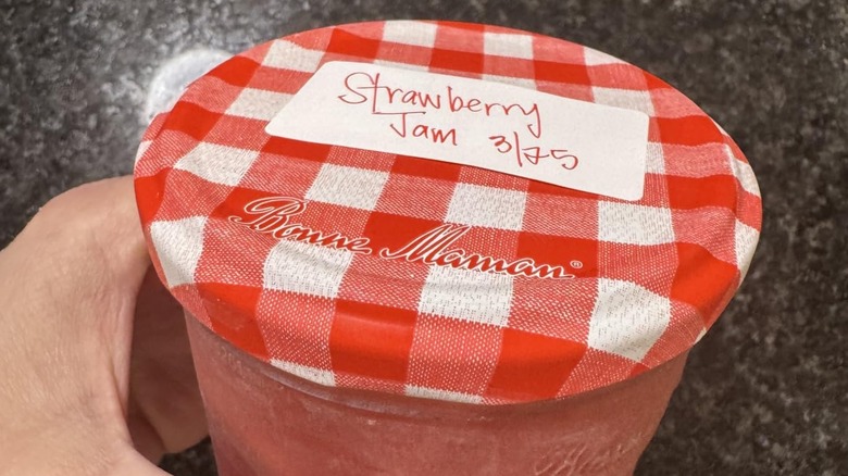 Strawberry jam jar with dishwasher and water-resistant label