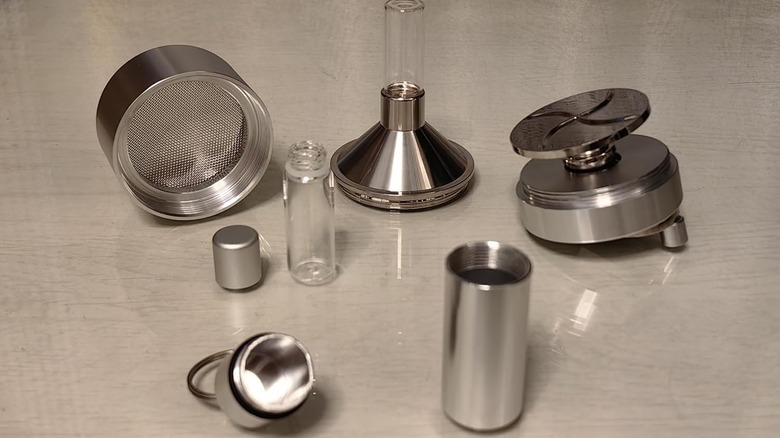 Kitchen spice grinder taken apart on table