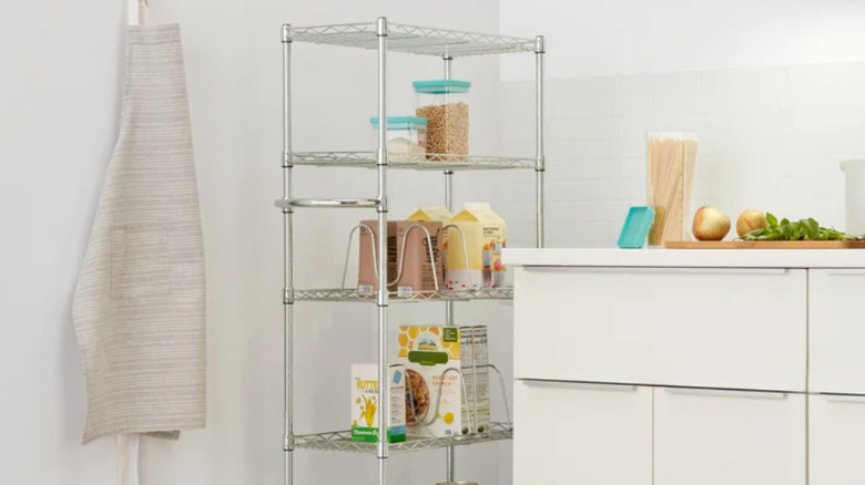 The wire rack tucked into the corner of a kitchen.