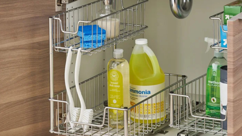 The tiered wire rack for under-the-sink storage.