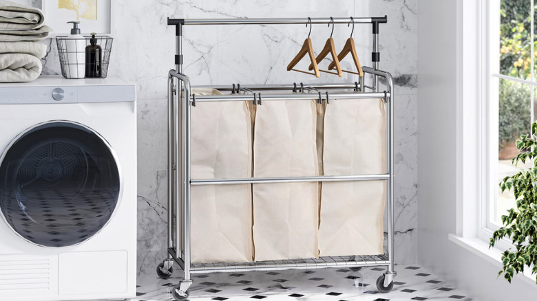 Seville Classics' 3-Bag Laundry Sorter with Adjustable Clothes Bar