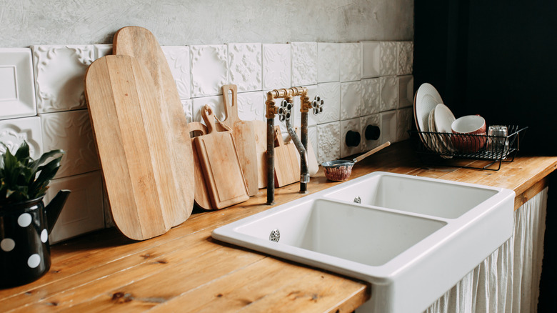 Kitchen with wood countertops and white sink