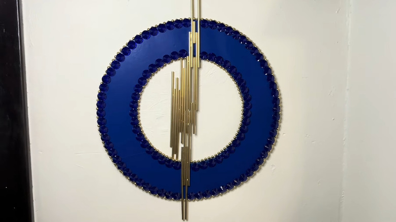 Geometric wall art made of Dollar Tree plate and plastic straws