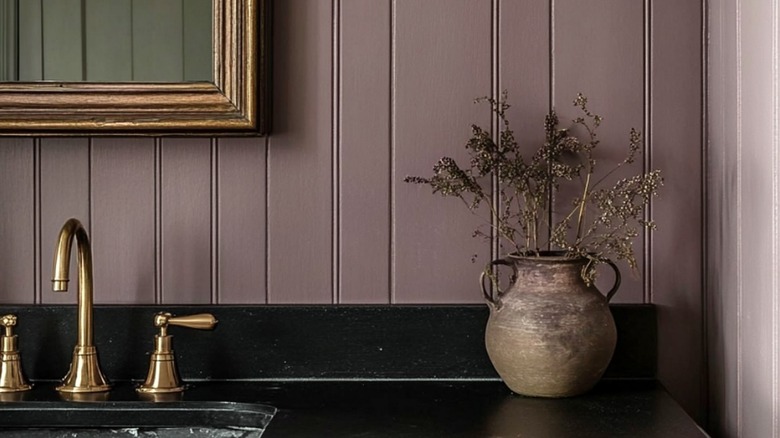 A bathroom painted deep mauve.