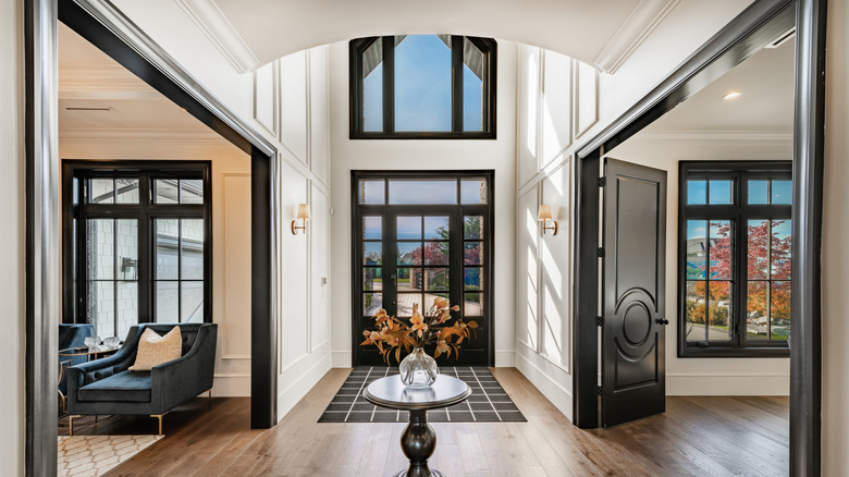 large, open foyer with ample windows and  high ceilings