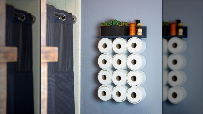 A PVC pipe storage solution holding rolls of toilet paper