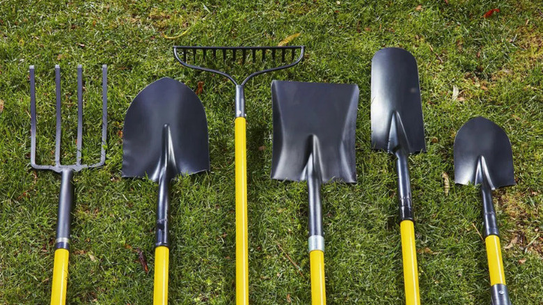A line-up of garden tools from One Stop Gardens, including its 62-inch bow rake