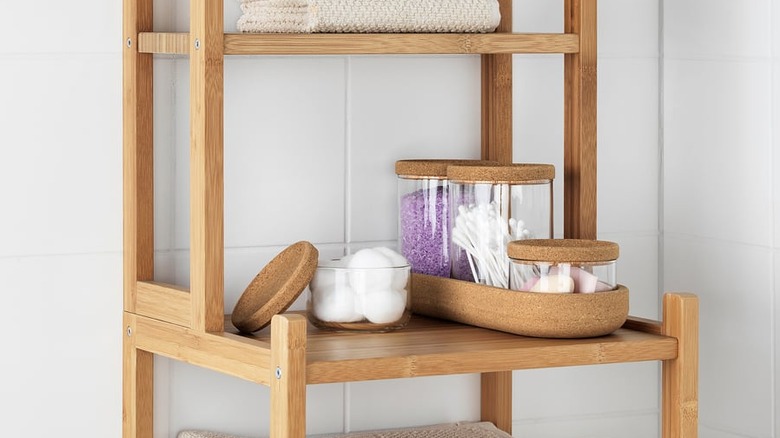 IKEA SAXBORGA set on wooden bathroom storage shelves