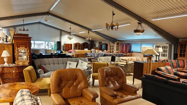 A vintage showroom with lots of furniture