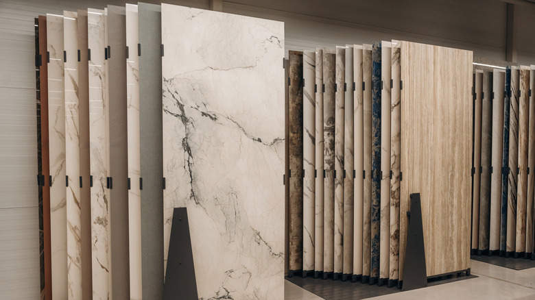 Large marble slabs lined up against a wall
