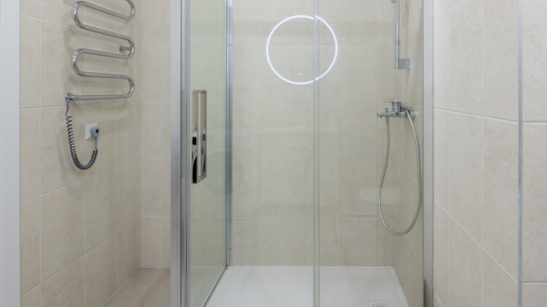 Wide glass door on shower
