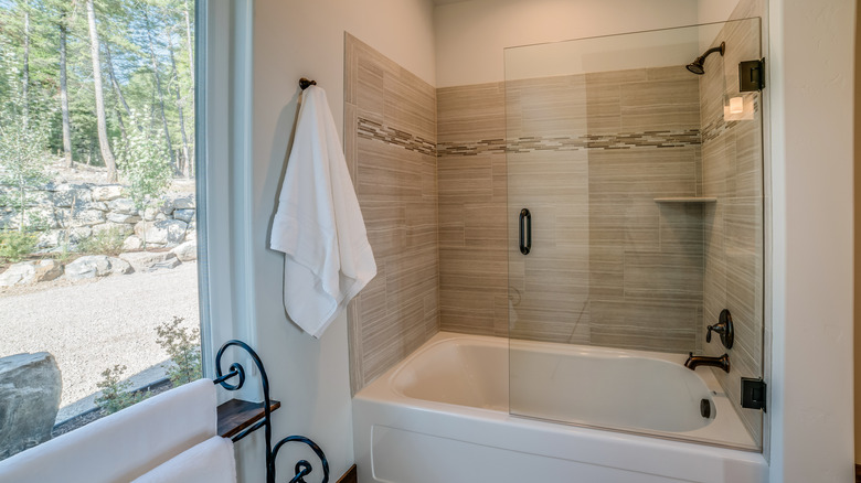 Shower tub combo in bathroom