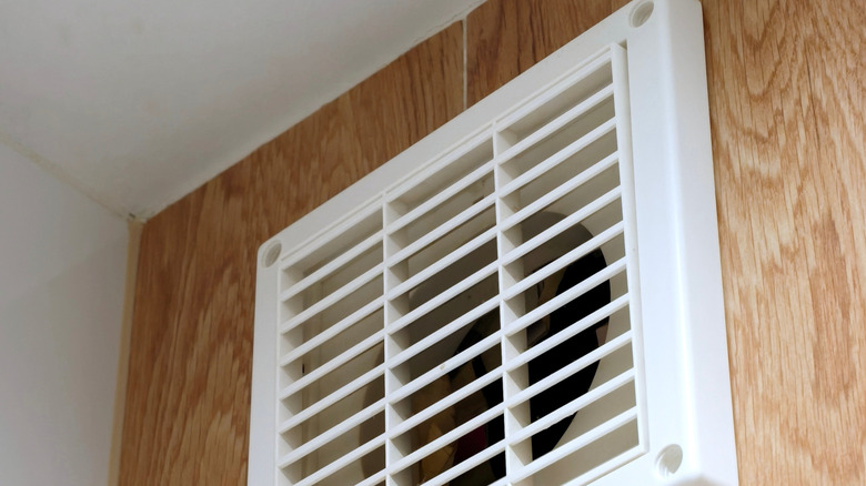 Close-up of a bathroom ventilation fan