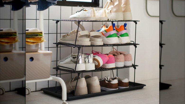Stack of GREJIG Shoe rack with shoes in entryway